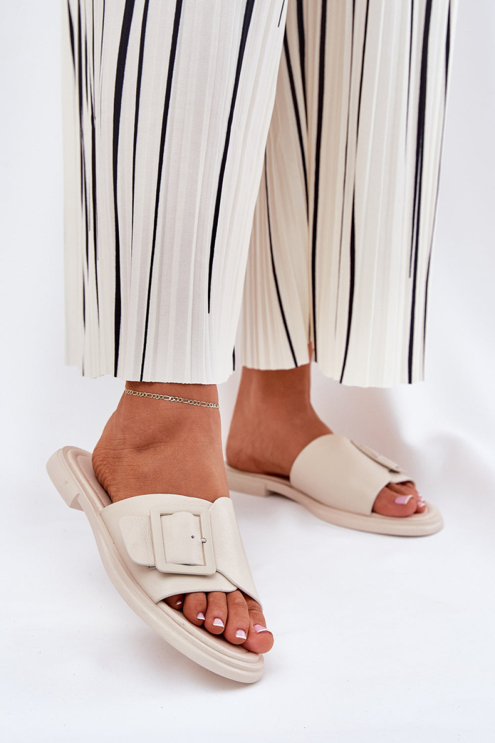 Step In Style Beige Flat Flip Flops with Buckle
