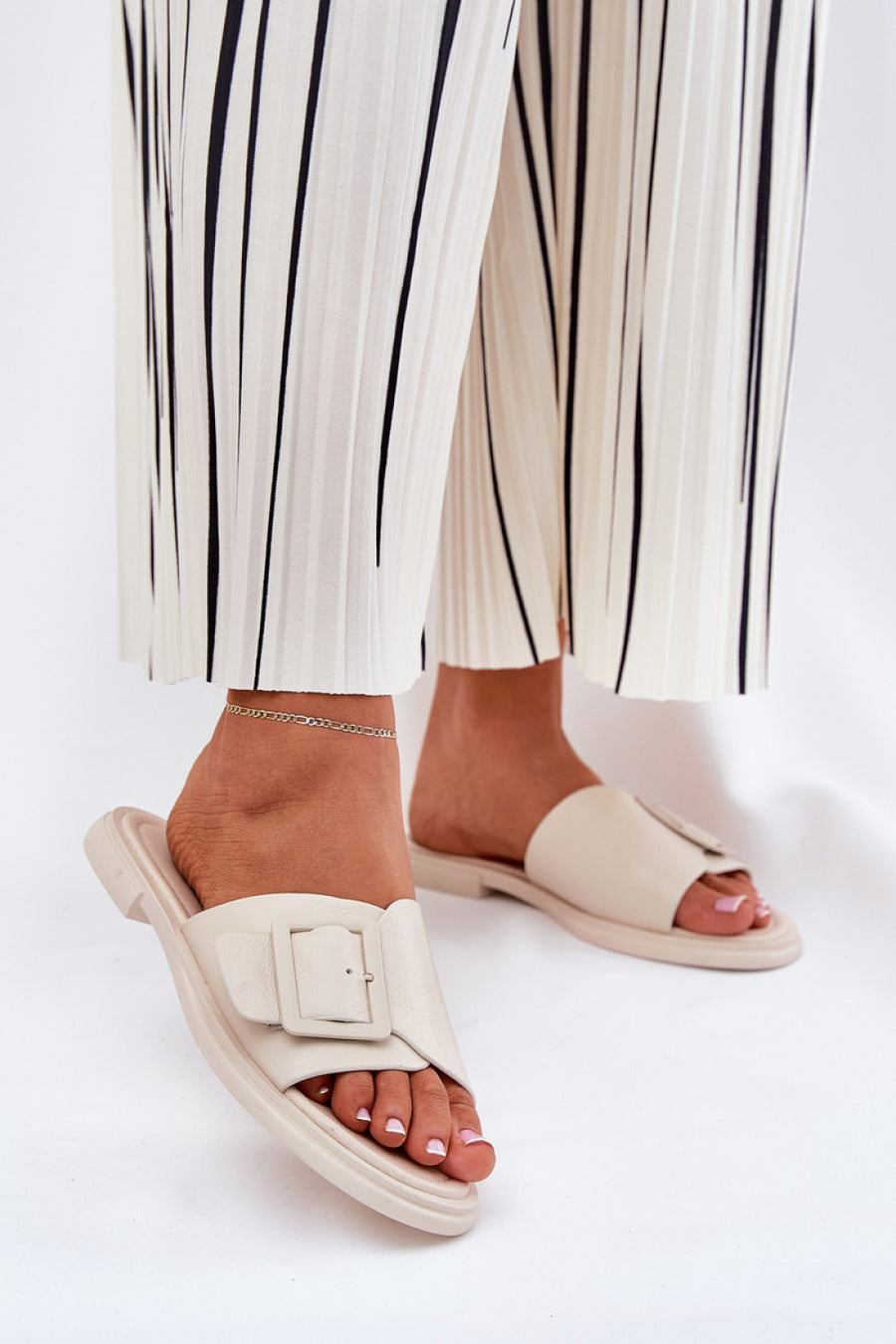 Step In Style Beige Flat Flip Flops with Buckle