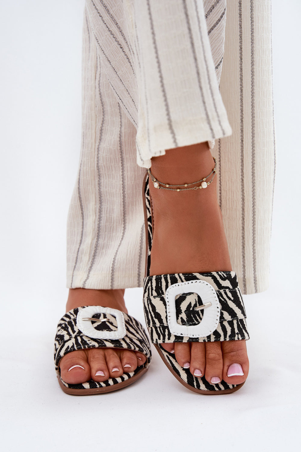 Step In Style Clariola Zebra Print Flip Flops