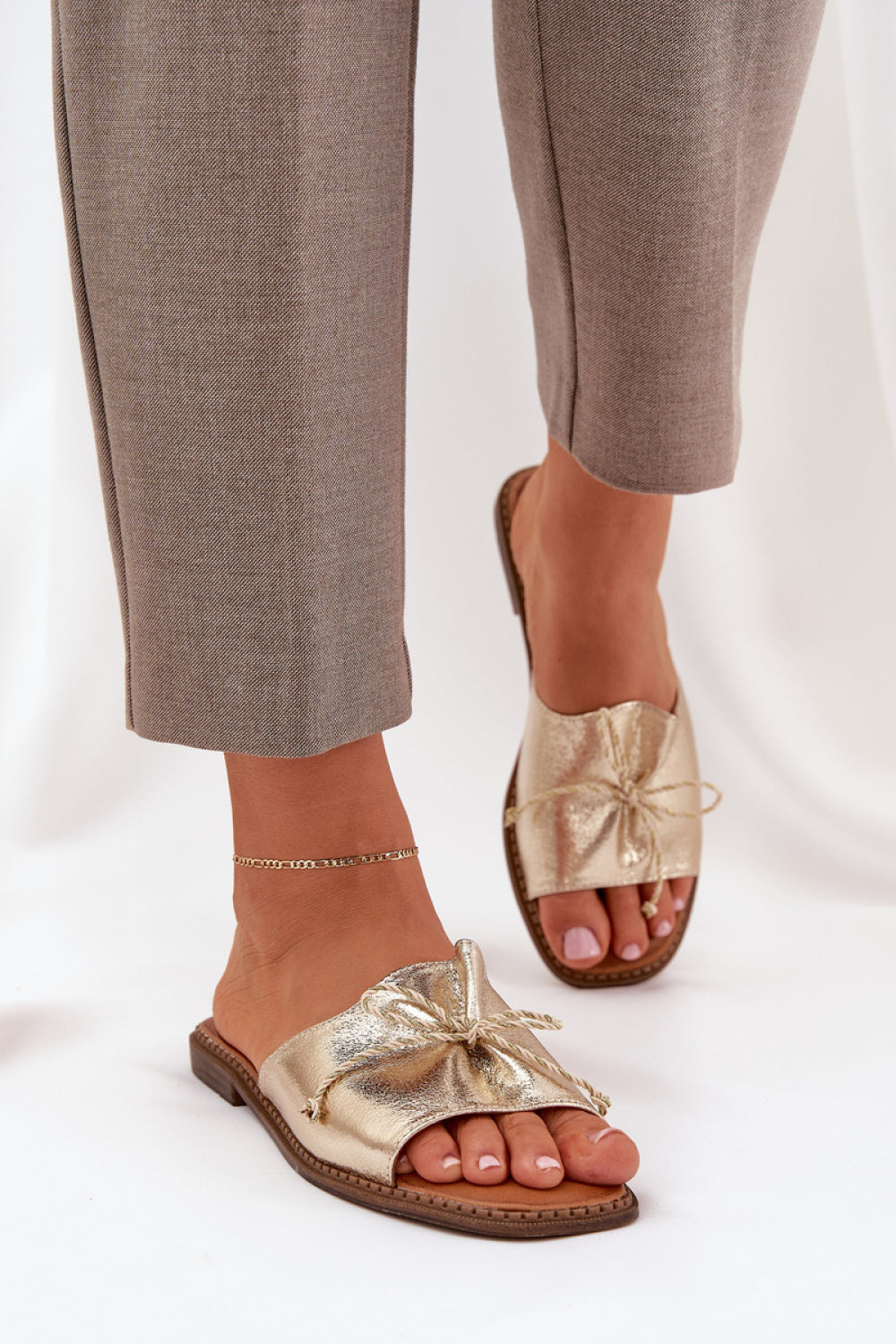 Step In Style Deonelis Gold Faux Leather Flat Flip Flops